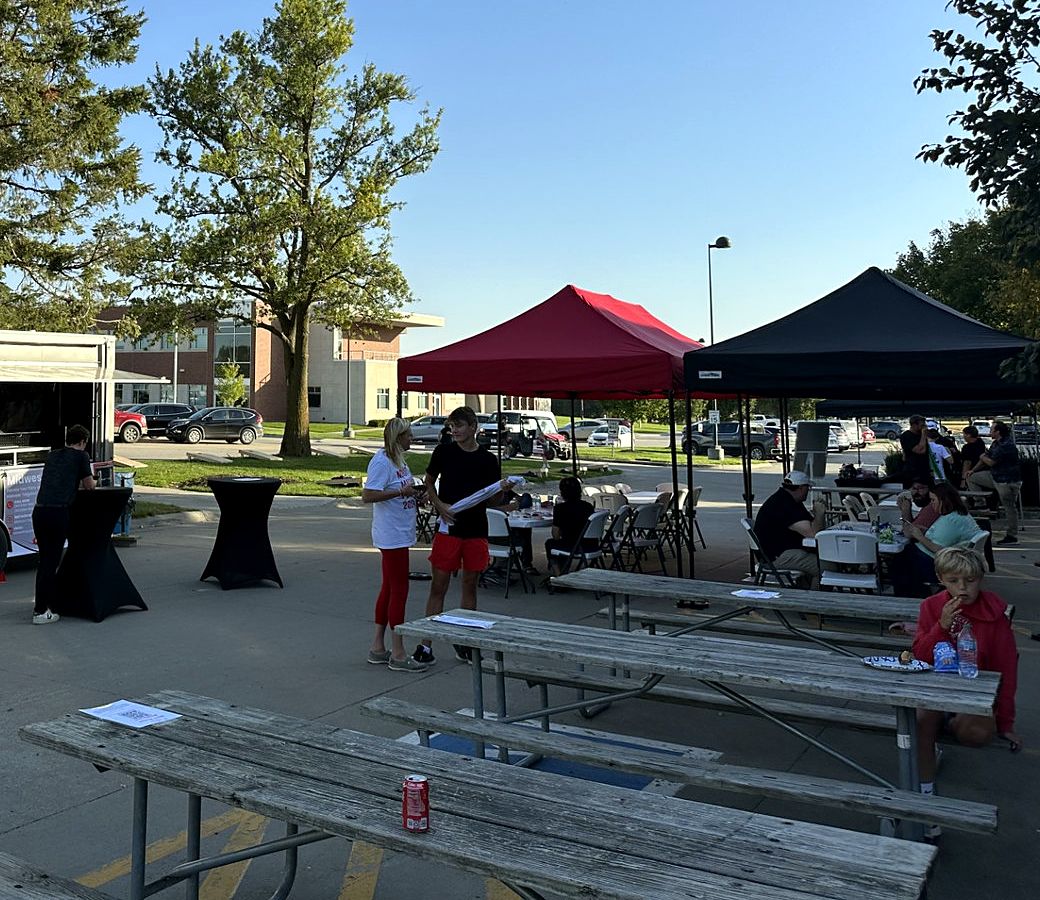 Canopy tents, tables and seating set up for an event
